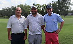 three male golfers posing for a photo